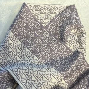 Michael Kors scarf. Lavender and white in color, new with tags.
